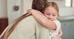 Girl, hug and mother with love or care at house for bonding with comfort and cheerful with trust. Parent, support and mom with daughter or embrace at family home for relationship in childhood.