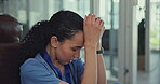 Stress, depression and medical nurse in a hospital corridor for mistake, anxiety or loss and bad news. Female healthcare worker or doctor sad, burnout or tired and frustrated with crisis or problem