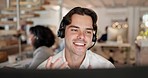 Happy man, call center and consulting with headphones in customer service, support or telemarketing at office. Face of male person, consultant or agent talking on headset for online advice or help