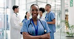 Black woman, doctor and smile for leadership, meeting or teamwork in confidence at the hospital. Portrait of happy African female person, nurse or medical professional in team management at clinic