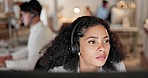 Woman, call center and thinking with headphones in telemarketing, customer service or support at office. Serious female person, consultant or agent reading on computer for online advice at workplace