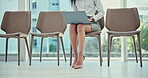 Woman, laptop and waiting room for recruitment or job opportunity at corporate office with hr. Interview, professional female and computer with sitting on chair for hiring with plan for candidate.