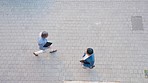 City, walking and aerial of business people on commute with files, documents and tablet on sidewalk. Professional workers, morning and men in urban town traveling for working, career and office