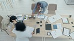 Business people, meeting and table in time lapse for teamwork, collaboration or planning above at the office. Top view of group working on documents in team strategy or project plan at the workplace