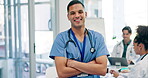 Man, doctor and arms crossed in team leadership, healthcare or meeting for planning at the hospital. Portrait of happy and confident male person or medical professional in health management at clinic