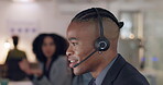 Call center, talking and face of a man with a headset for customer service or advice. Happy african male consultant speaking for telemarketing, telecom or crm and technical support at help desk