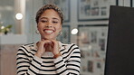 Face, smile and computer with a business woman at a desk in her office looking happy in her career. Portrait, positive mindset and confident with a young female employee sitting in the workplace