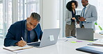 Laptop, writing in a notebook and a business black man in the boardroom for planning or online research. Computer, technology and internet search with a young male employee working in the office