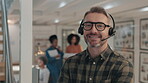 Happy man, call center or face of manager with arms crossed in customer service or telemarketing. Proud, portrait or confident senior consultant agent with headphones, success or smile at workplace