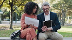 Park, paperwork and employees working on a tablet in collaboration or partnership together planning a meeting. Schedule, nature and people in discussion of ideas or brainstorming creative project