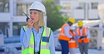 Construction worker, talking and communication on radio, walkie talkie on site for industrial project management or planning. Woman, engineer or inspection of contractor, architecture or safety