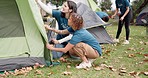 Park, camp counsellor and tent help outdoor with support from a girl while camping, Nature, vacation and survival education with young children and woman together with freedom and youth knowledge