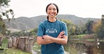 Nature, portrait of happy woman with arms crossed at summer camp and counsellor in woods with pride. Forest, lake and face of camping volunteer girl with confidence, support and leadership training.