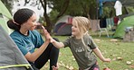 Child, camp counsellor and high five with support from a girl on camping trip, Goals, smile and team building success with young children and woman together with freedom and emoji hand sign in nature