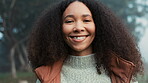 Portrait, face and a happy woman outdoor in nature to relax and breathe fresh air. Vacation, calm woods and closeup of a young african girl on holiday or hike on misty morning with a confident smile