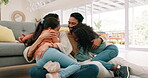 Happy family, parents and children hug at home with love, happiness and care. Multiracial man, woman and girl kids relax together on a living room floor for fun embrace, play and quality time
