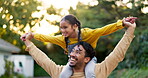 Happy, walking and a father and child in nature during sunset for bonding, care and love. Smile, holding and a young dad carrying a girl in a park or countryside, playing and laughing together