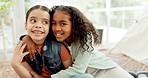 Family, sisters and children hug at home for love, care and happiness while playing together. Portrait of multiracial girls, kids and siblings or friends embrace for fun, quality time and bonding