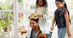 Family, father and girl children with crown in a living room bonding, playing and having fun in their home. Love, games and sister kids with parent and crown in lounge happy, playful and smile