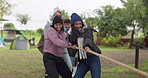 Tug of war, competition and team building with friends in nature, pulling a rope together in a contest. Fitness, teamwork and strength with a group of young people outdoor to compete in a game