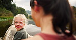 Mother rowing, child and kayak in lake on holiday, vacation and travel together. Mom, girl and kid in canoe, boat and bonding in river, water and fitness exercise on adventure with family outdoor.