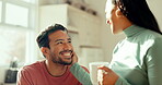 Love, coffee and happy with couple in kitchen for trust, support and conversation. Relax, smile and morning with man and woman drinking tea together at home for wellness, happiness and free time