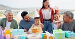 Happy family, birthday and applause for cake, party or love for son, grandparents and parents at celebration. Men, women and young children with hug, bonding and present for event at house on holiday