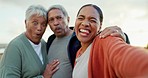 Selfie, silly and woman with her senior parents on a family, tropical and island holiday on beach. Laughing, funny and portrait of elderly couple taking picture with adult daughter with goofy face.