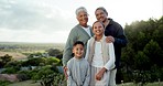 Smile, face and grandparents with their grandchildren in nature on family holiday or vacation. Happy, love and portrait of senior man and woman in retirement bonding with kids on outdoor weekend trip