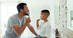 Father, kid and how to brush teeth in bathroom for hygiene, morning routine together and healthy learning. Family of dad, boy child and dental cleaning with toothbrush for self care of fresh breath