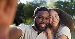 Love, selfie and face of a couple in nature on a romantic date in a garden while on a holiday. Happy, smile and portrait of African young man and woman taking picture together in park on weekend trip