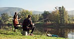 Fishing, lake and friends in nature on camping holiday, adventure and vacation together outdoors. Friendship, relax and women and men with rods by river for sports hobby, activity and catching fish