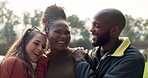 Portrait, group and friends together for a kiss, hug and love in outdoor park or people in nature on the weekend, holiday or winter vacation. Happy, face and couple embracing a girl or friend 