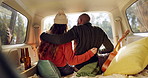 Hug, winter and a couple in a car for a road trip, date or watching the view together. Happy, travel and back of a man and woman with an affection in transport during a holiday or camping in nature