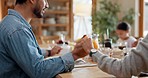 Holding hands, family praying and food for lunch at table in home with worship of gratitude, respect and thanks. Closeup, spiritual people and faith for prayer before eating dinner together in house