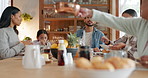 Brunch, food and love with big family at table for breakfast, nutrition and relax. Happiness, health and support with parents and child in dining room at home for wellness, helping and happy together