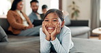 Happy, face and girl on the sofa in the living room, lounge or kid watching tv with parents in family home. Relax, smile and portrait of child streaming a movie on the couch in the apartment