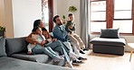 Family, child and hug on sofa with parents love, support and care in new home, living room or apartment. Couch, lounge and mother, father and kids or children relax together for happy holiday