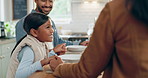 Family, eating together and praying in kitchen, parents and child with faith, gratitude and God, food and nutrition. Health, wellness and prayer with girl, man and woman at home, worship and hunger