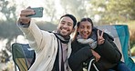 Camping, selfie and couple of friends with peace, hands and bonding in a forest with freedom and smile. Profile picture, smile and man with woman at campsite in nature, relax and having fun in woods