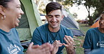 Camping, planning and volunteer friends laughing outdoor while together on an outreach for the community. Team, discussion and group of young people talking at their campsite for charity or activism