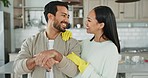 Couple, spring cleaning and home with care and house work with chores and clothes. Kitchen hygiene, disinfection and smile of a woman and man together in a house with housekeeping and love to wash