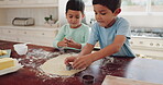 Sibling, bake and tools with flour in kitchen with learning for development with dough in home. Kid, together and cookies with teamwork or shape for bond in childhood with cooking or wheat in house.