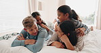 Parents, bed and happy family in conversation in a bedroom or mother and father as bonding with children together. Happiness, love and kid talking with mom and dad in the morning at home for care