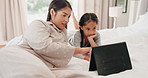 Morning, tablet and mother with daughter in bedroom for streaming, website and social media. Happy, elearning and technology with woman and child in family home for games, internet and communication