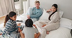 Relax, conversation and morning with family in bedroom for wake up, support and playful. Happiness, peace and love with parents and children in bed at home for free time, happy and bonding