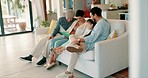 Grandparents, dad and child on sofa with book, bonding and happiness in living room of family home. Storytelling, learning and teaching, grandmother, men and small girl on couch together with reading