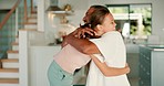 Happy, hug and girl child with her father bonding together in the kitchen of their family home. Happiness, smile and young kid embracing her dad with love and care for a sweet moment in modern house.