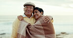 Senior couple, hug and happy at the beach for love, commitment and adventure outdoor. A man and woman at the ocean for freedom, retirement and peace on holiday, travel or vacation on cold day