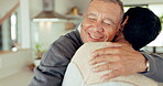 Elderly couple, love and hug in home, smile and bonding together for romance. Happy, senior man and woman embrace, enjoying time in retirement with care and commitment in marriage, support or trust.